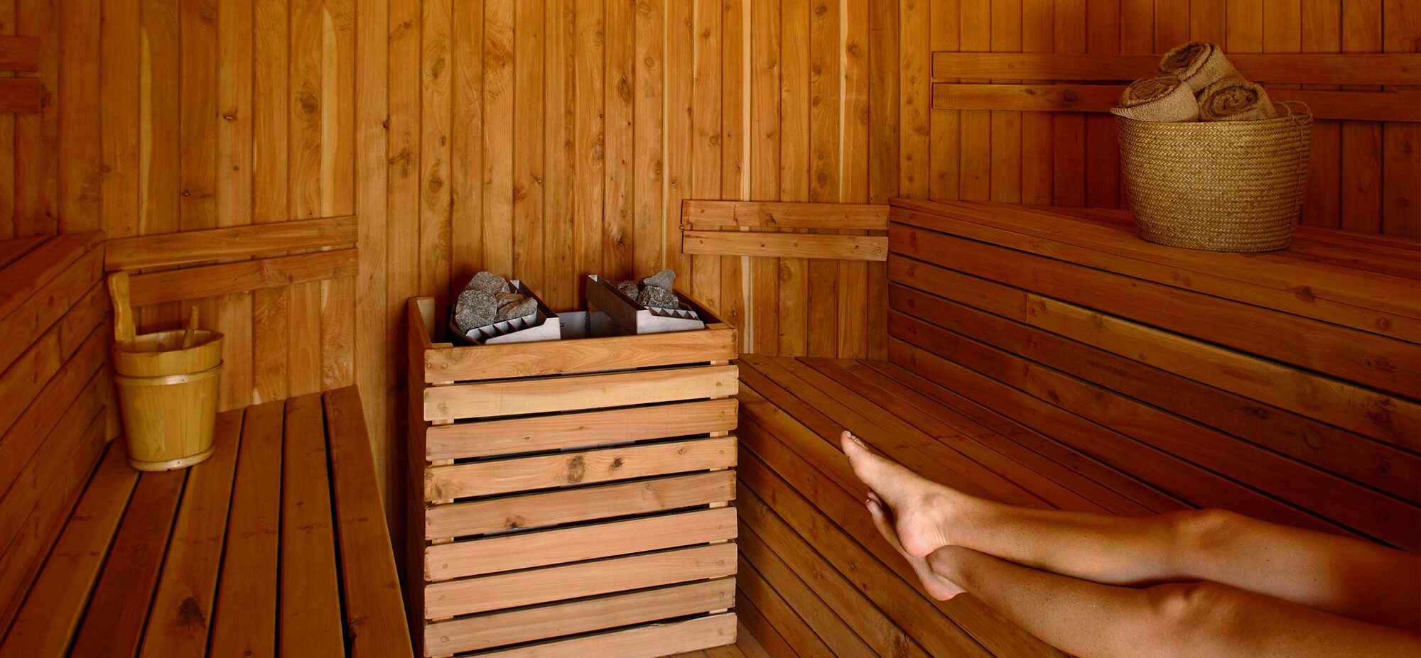A person sitting in a sauna