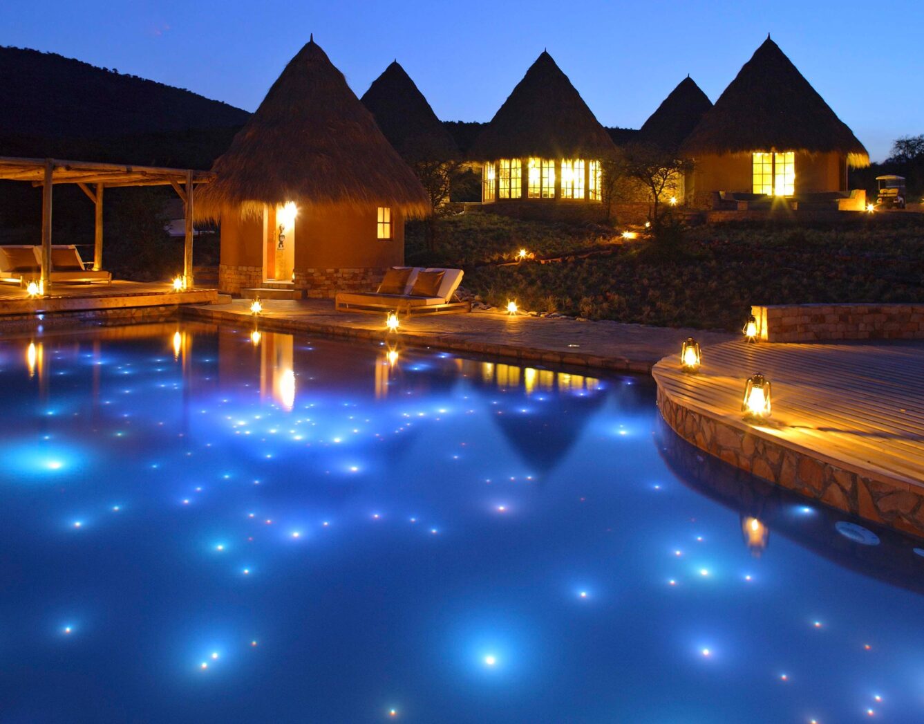 Star lit pool in front of the spa reception building